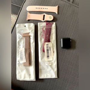 Apple watch series 3 Black with three bands and wall charger plug